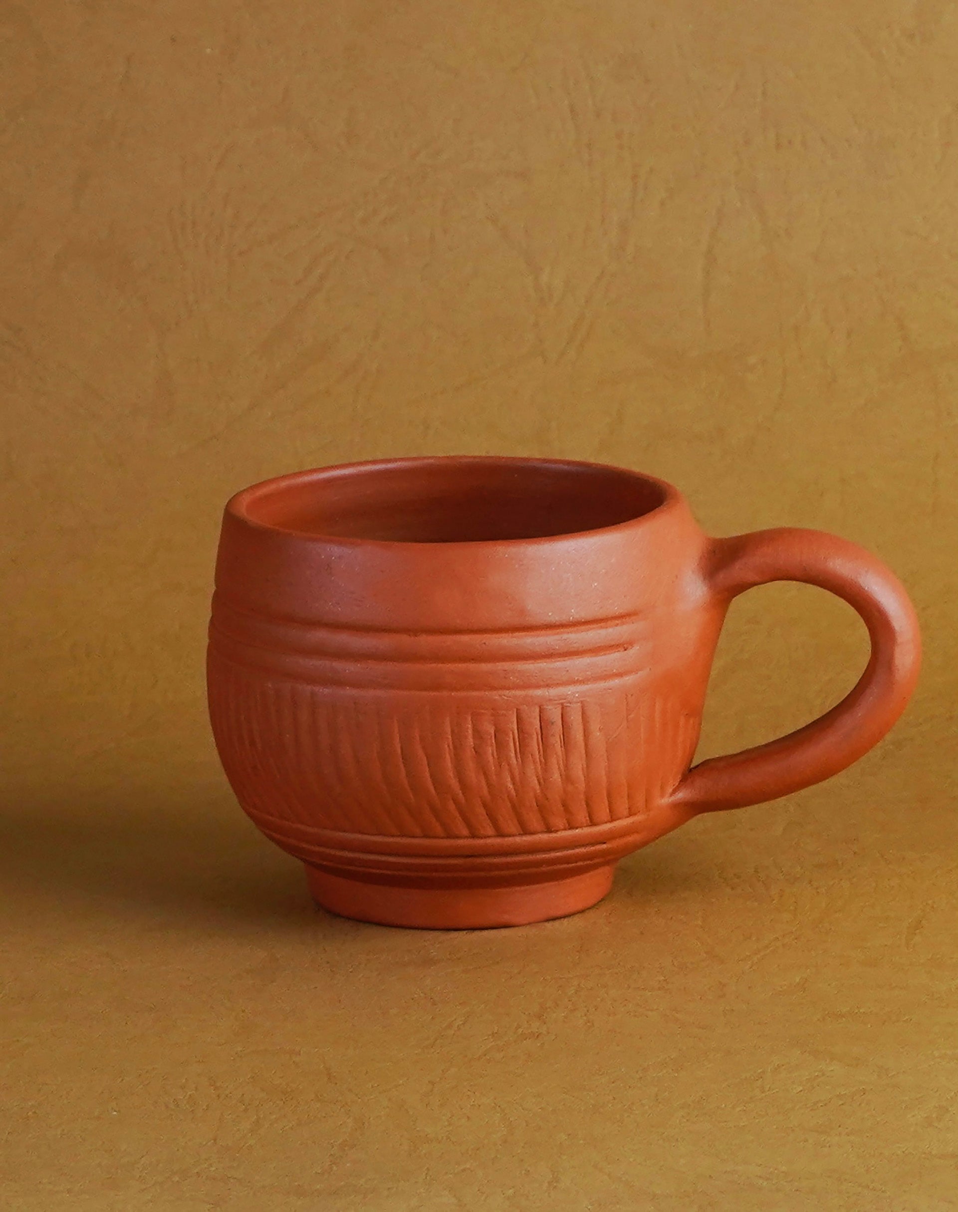 Clay terracotta tea cup